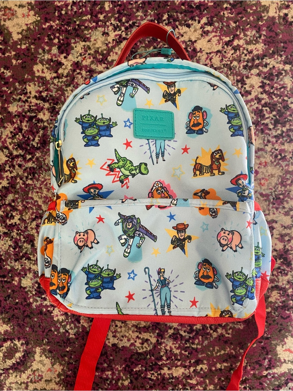 Posh Peanut Light Blue Toy Story Print Kids Backpack with Red Accents